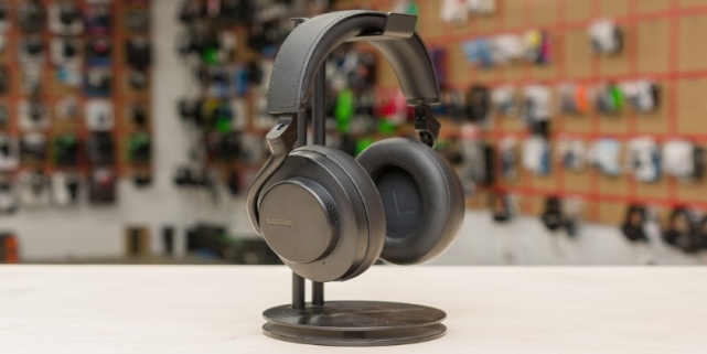 A black headphones on a stand AI-generated content may be incorrect.